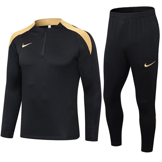 CONJUNTO NIKE NEGRO CON DORADO